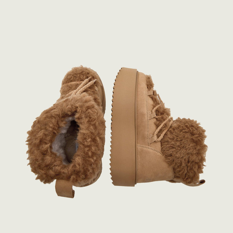 Combinazione di camoscio e tessuto teddy
